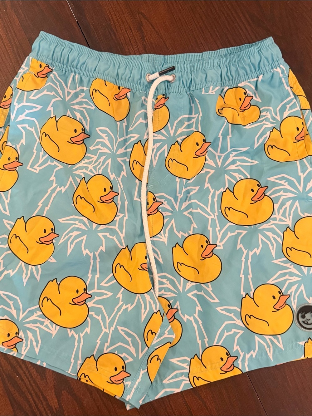 Neff Men’s Light Blue Swim Trunks with Yellow Rubber Duck Print
